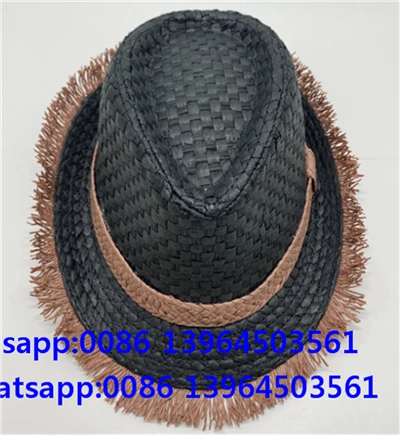 El dokuması siyah fedora püskül şapkası