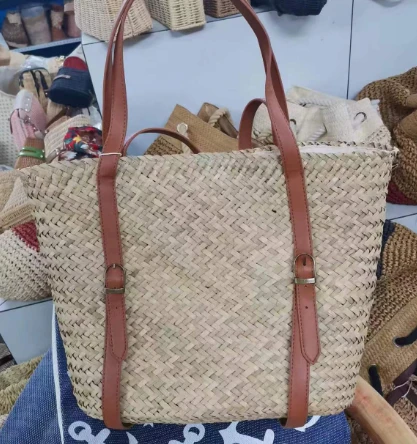 Long Pu, saman şık çantayı işler